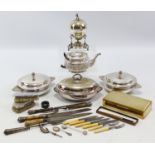 A Victorian embossed silver-plated teapot; three silver-plated entrée dishes; a pair of meat