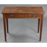 A mahogany side table, with plain rectangular top above a frieze drawer, with oval brass ring