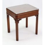 A mahogany low coffee table, with canted corners to the rectangular top, & on square legs, 20¾”