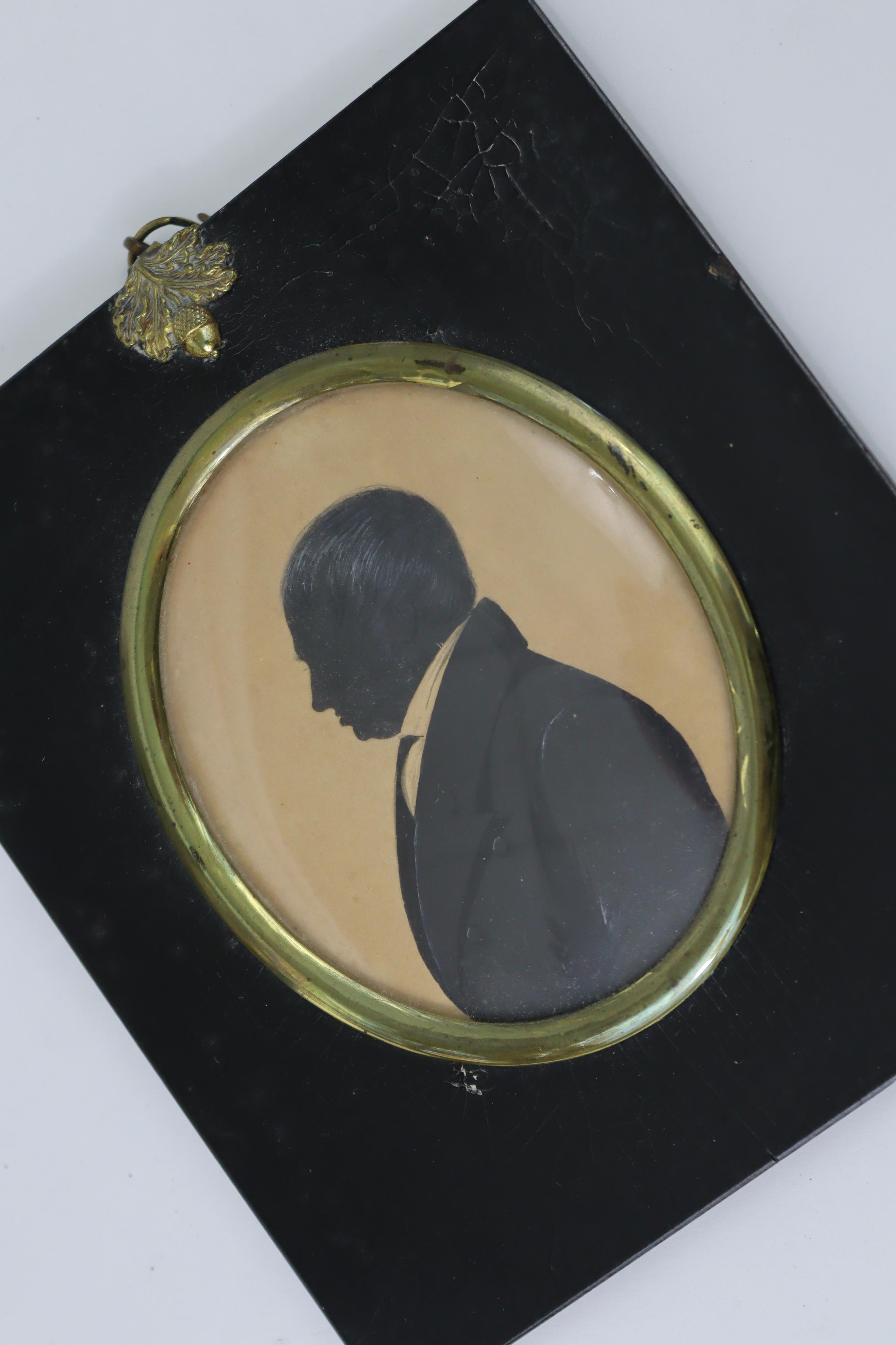 A 19th century miniature oval silhouette female portrait study titled to reverse “Elizabeth Nelson”; - Image 3 of 3