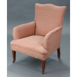 A 19th century armchair with shaped square back, padded arms & seat upholstered floral damask, on