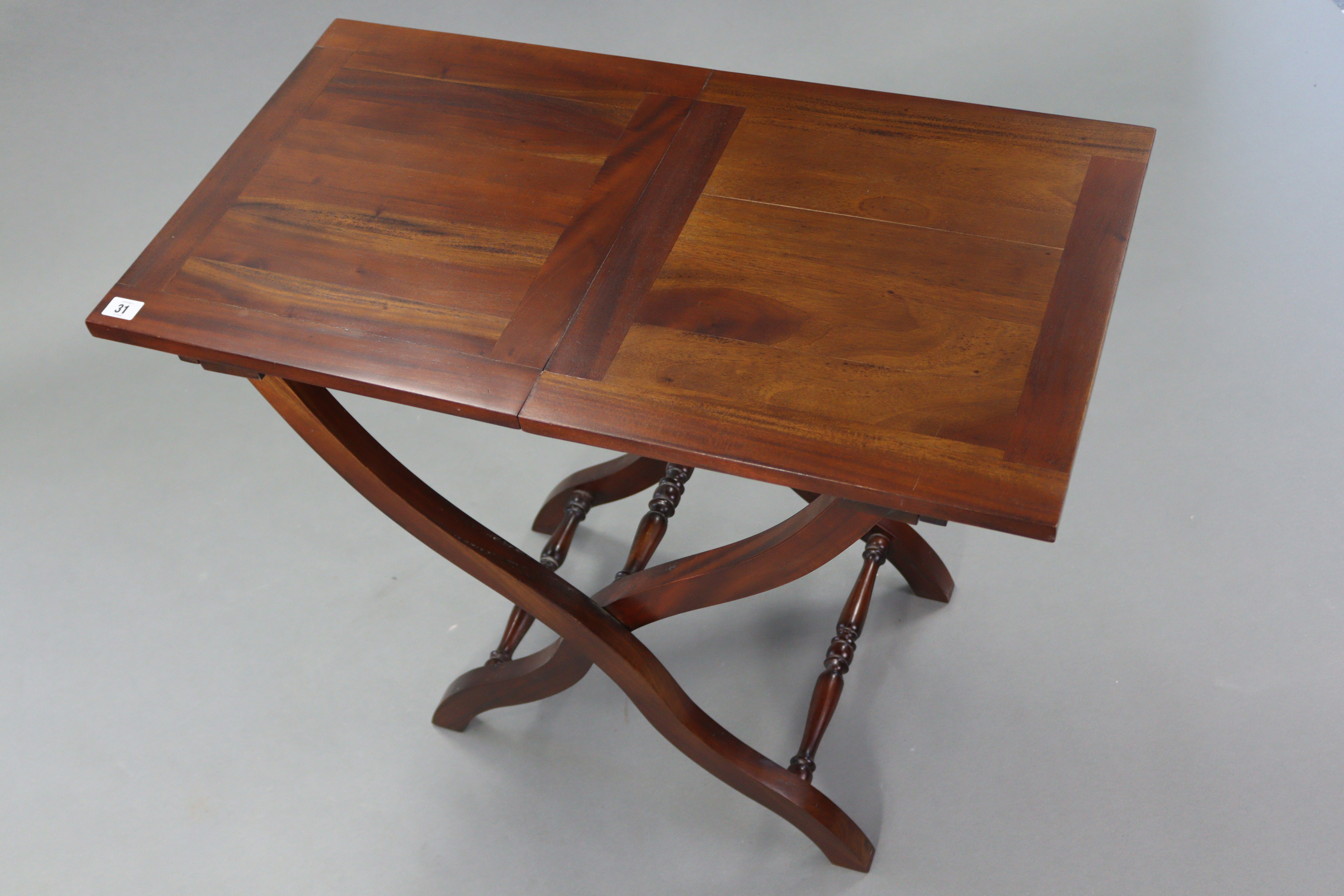 A mahogany coaching table with rectangular folding top, & on shaped legs with turned stretchers, 32” - Image 2 of 2