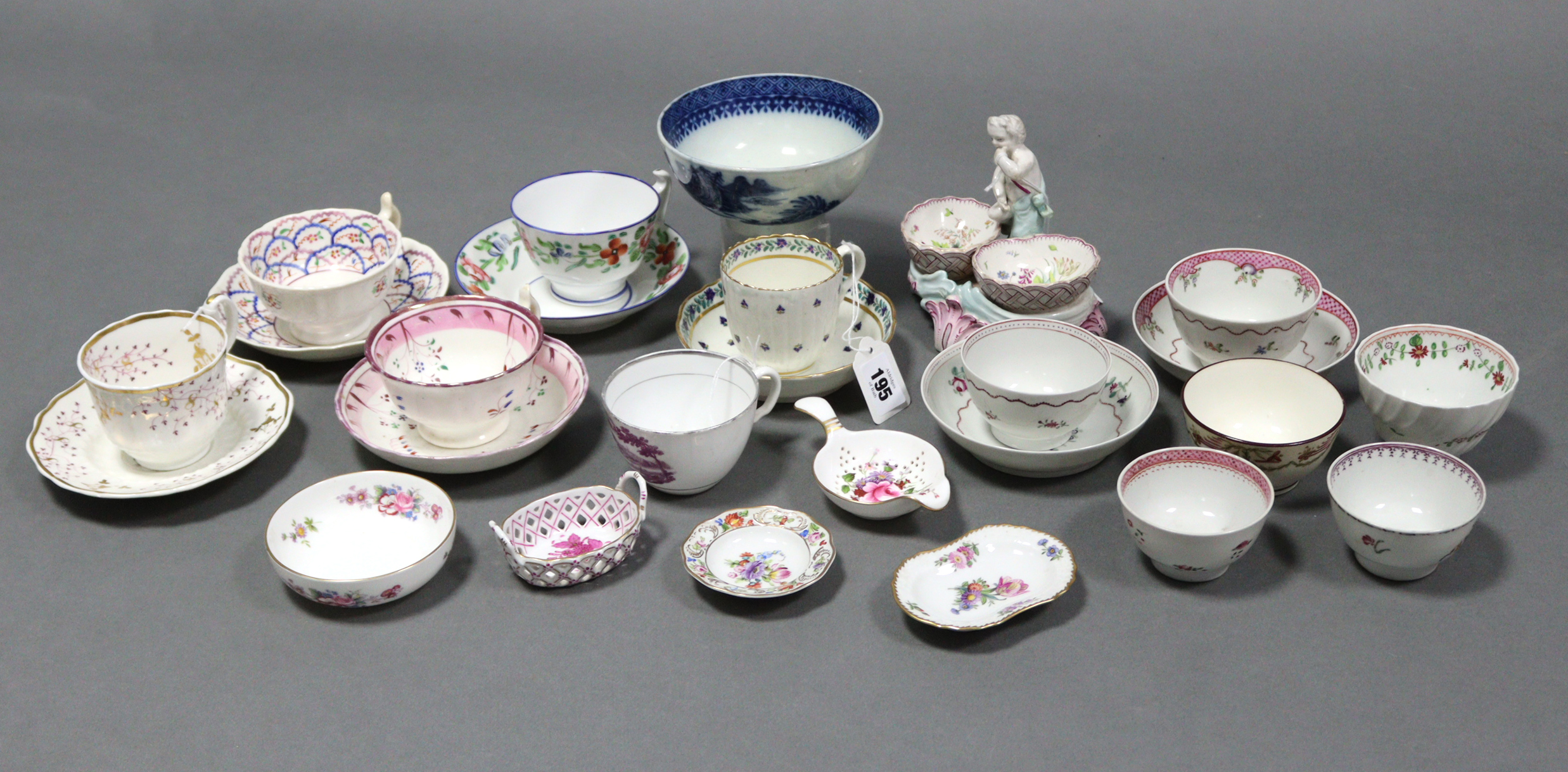 A late 18th century English porcelain fluted coffee cup & saucer; two ditto teabowls & saucers; four