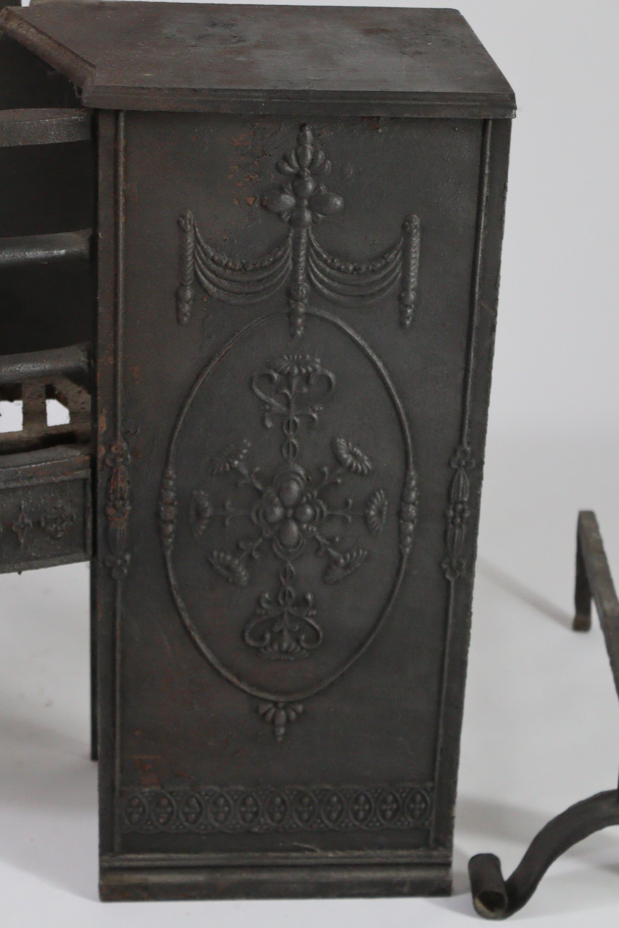 A cast-iron fire grate with Adam-style relief decoration, 35” wide x 24½” high; together with a pair - Image 4 of 4