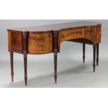 A GEORGE III FIGURED MAHOGANY, ROSEWOOD CROSSBANDED, & LINE-INLAID SIDEBOARD, the inverted break-