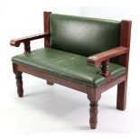 A hardwood frame bench, with padded back & sprung seat upholstered green leather, with open