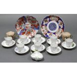 A set of eight Herend porcelain floral painted coffee cups & saucers; a ditto leaf-shaped cream