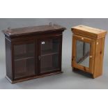 A mahogany wall cabinet fitted centre shelf enclosed by pair of bevelled glazed doors, 27½” wide x