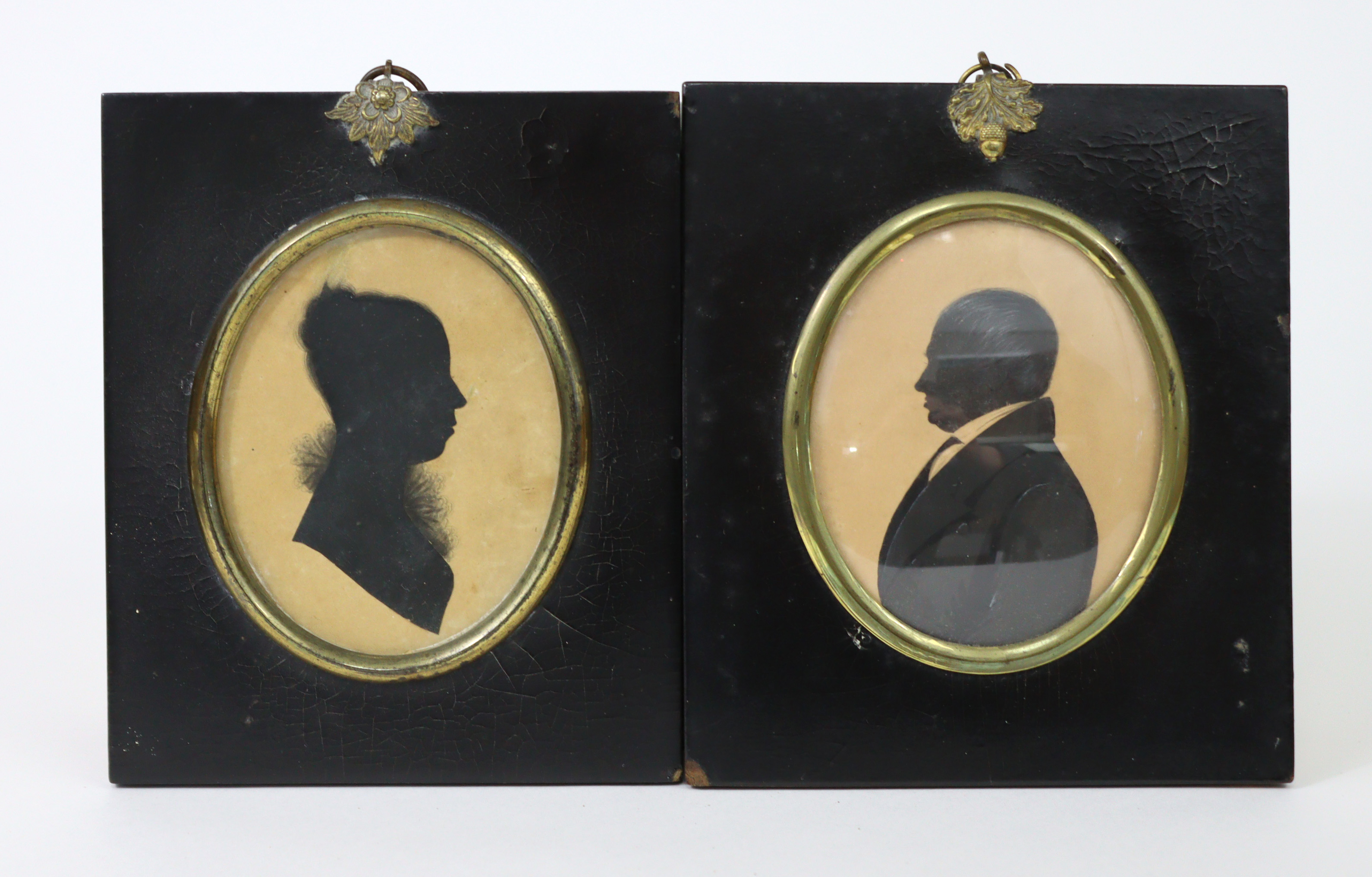 A 19th century miniature oval silhouette female portrait study titled to reverse “Elizabeth Nelson”;