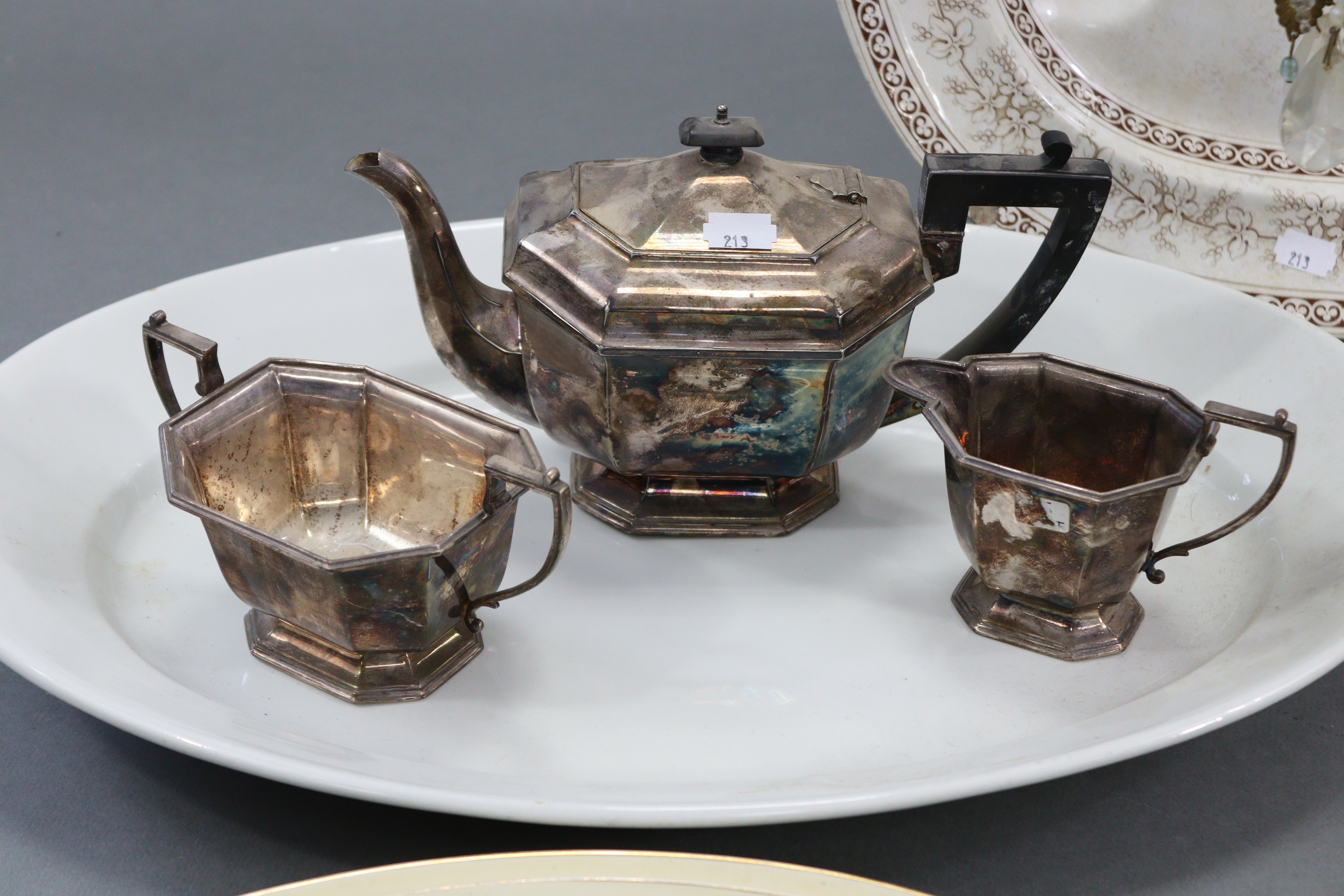 A Lingard pottery novelty “Humpty Dumpty” teapot, 7” high; a silver-plated three-piece tea - Image 3 of 9