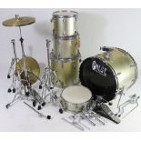 A matched seven-piece drum-kit.
