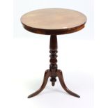 A late 19th century mahogany tripod table with circular top, & on vase-turned centre column &