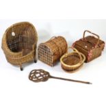 A wicker cat basket with domed canopy, 22” high; a ditto carrier; a wicker carpet beater, 31”