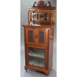 A Victorian walnut side cabinet, with raised mirror-back & broken-arch swan-neck pediment above