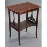 An Edwardian inlaid mahogany rectangular two-tier occasional table on square tapered legs, 22”