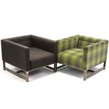 Two square-back easy chairs (one upholstered grey material, the other green chequered material) & on