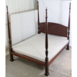 A COLONIAL GEORGE III STYLE MAHOGANY FOUR-POSTER BED, the four turned & reeded tapering posts with