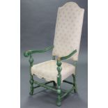 A William & Mary style painted armchair, with tall padded back & seat upholstered cream fabric, with