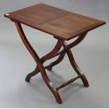 A mahogany coaching table with rectangular folding top, & on shaped legs with turned stretchers, 32”