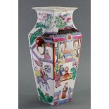A Cantonese porcelain vase of square tapered form, painted with various figure scenes; 11¾” high. (