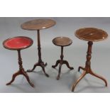 A 19th century mahogany tripod table with oval tilt-top, & on vase-turned centre column & three
