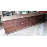 AN EARLY-MID 20th CENTURY WHITE PAINTED & NATURAL PINE SHOP COUNTER (with later top), fitted four