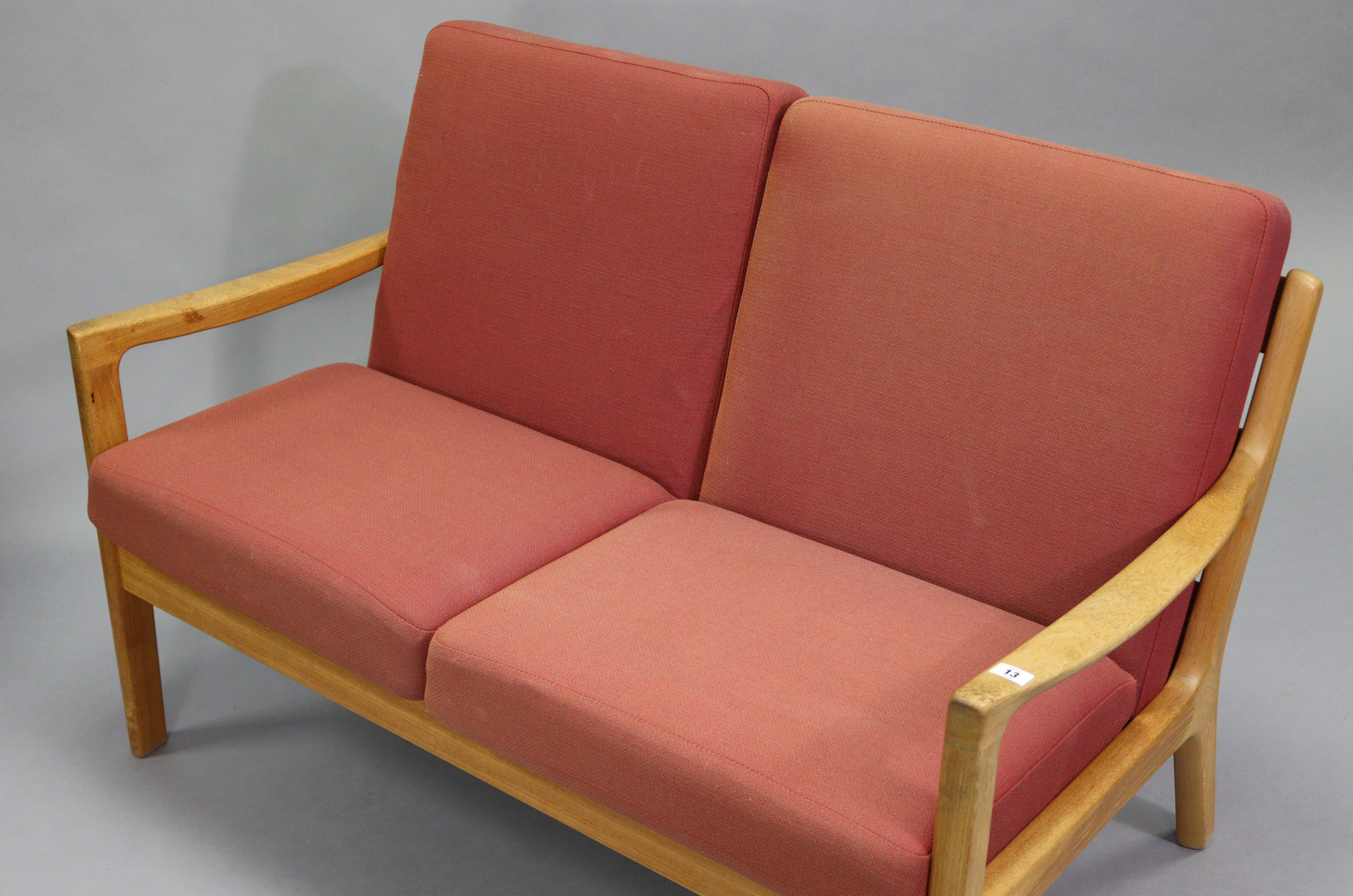 A Danish teak two seater settee by P. Joppensen Furniture, with removable seat cushions; 49½” wide x - Image 2 of 6