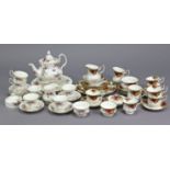 A Royal Albert “Old Country Roses” pattern twenty eight piece part tea service; & a Royal Albert “