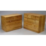 A pair of modern pine chests, each fitted two short & two long drawers with leather tab handles, 36”