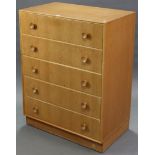 A MEREDEW FURNITURE mid-20th century light oak chest, fitted five long graduated drawers with turned