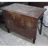 A late 19th century mahogany drop-leaf side table on square chamfered legs, 36” wide.