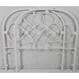 A pair of Victorian style white painted cast & wrought iron single bed headboards; 36” wide.