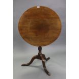 A George III oak tripod table with circular tilt-top & on vase turned centre column, 27” diam. w.a.