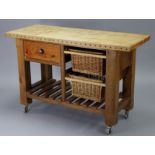 A pine butcher’s block/kitchen island, the 1½” thick top with inlaid lozenges to the frieze, the