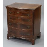 A reproduction 18th century-style mahogany bow-front low chest, with moulded edge to the crossbanded