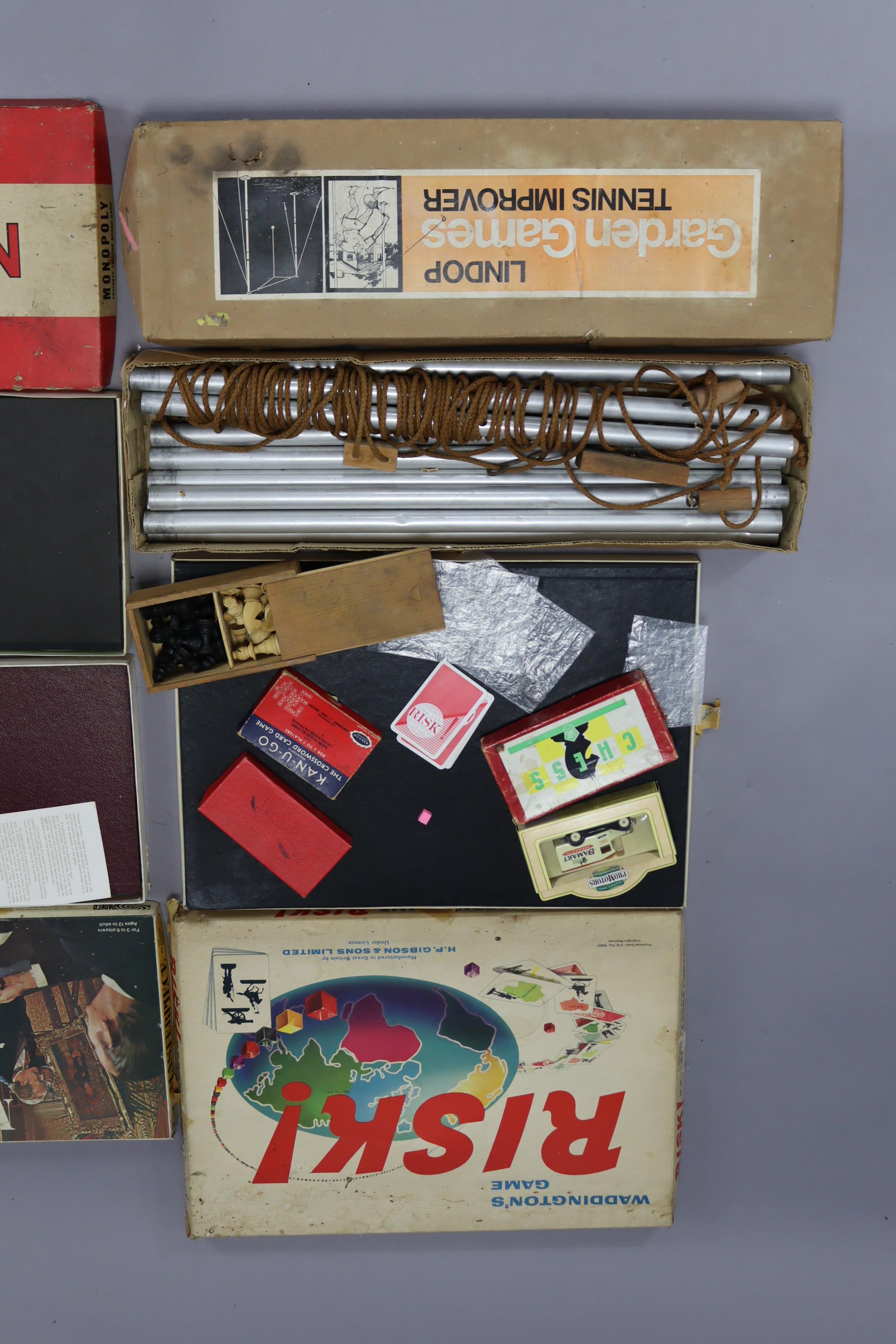 A LINDOP GARDEN GAMES “TENNIS IMPROVER”, boxed; together with various board games; & a carved wooden - Image 2 of 2