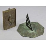 A Middle Eastern brass combination sundial compass, with folding dial & engraved chart to the