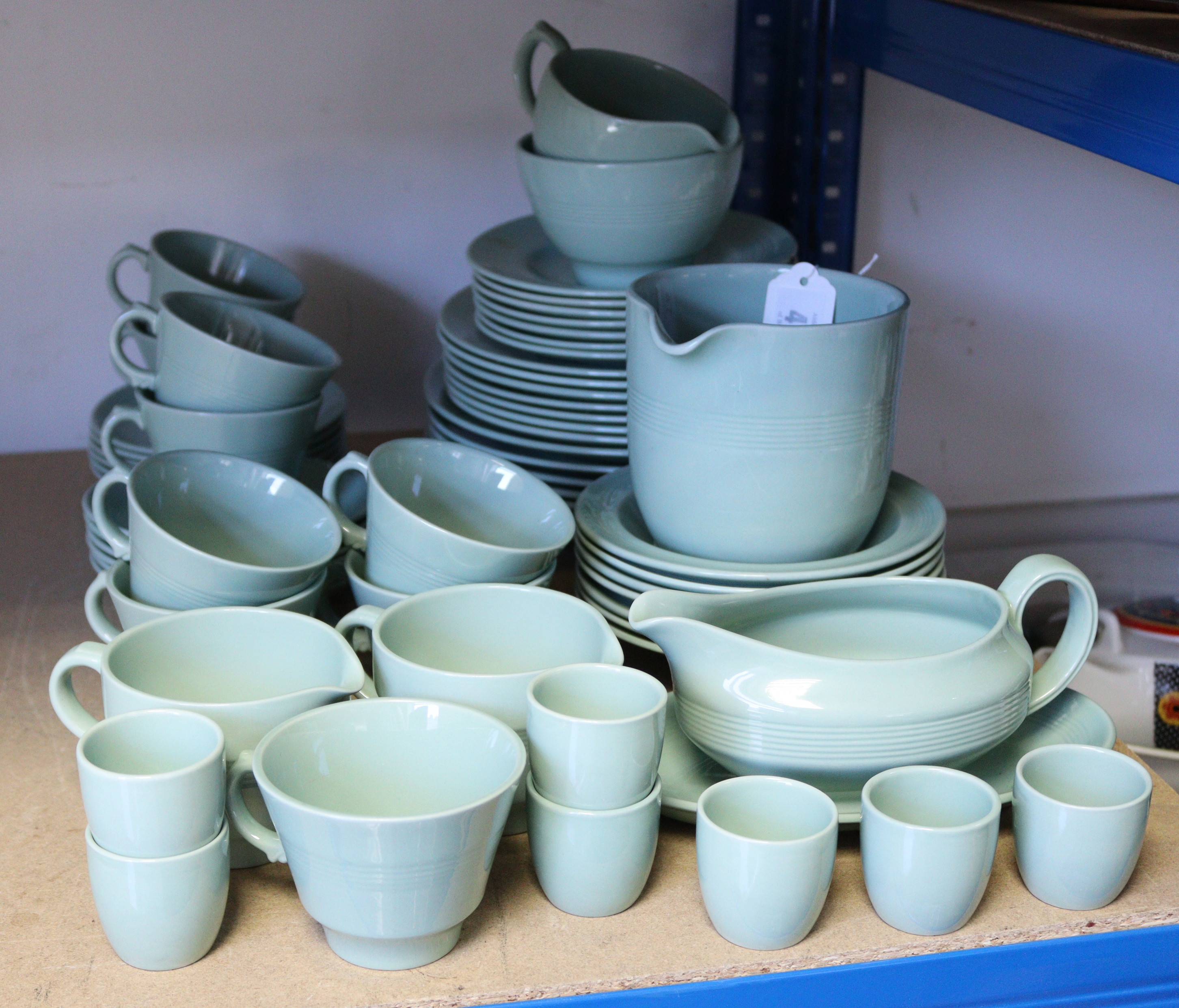 A Woods ware “Beryl” pattern sixty three piece part dinner & tea service, (part w.a.f.).