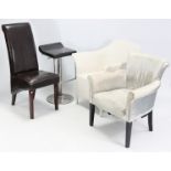 A tub-shaped easy chair upholstered silvered leather; together with two other chairs; & a swivel