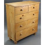 A late 19th/early 20th century pine chest with plain rectangular top, fitted two short & three long
