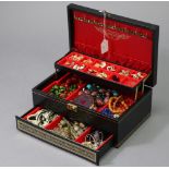 Various items of costume jewellery contained in one jewellery box.