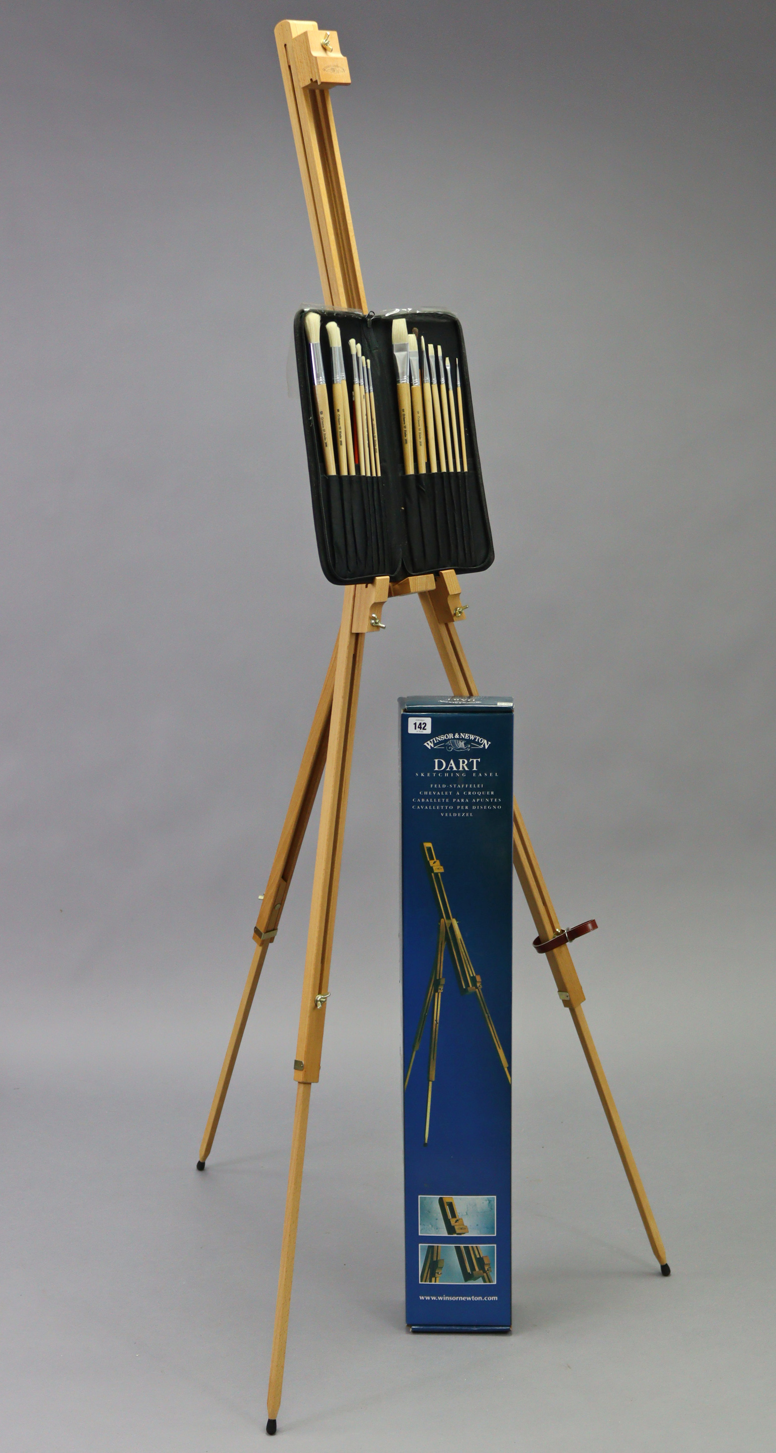 A Winsor & Newton “Dart” artist’s fold-away easel (boxed), 36¼” high un-extended; together with a