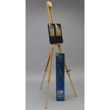 A Winsor & Newton “Dart” artist’s fold-away easel (boxed), 36¼” high un-extended; together with a