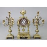 A 19th century French gilt brass clock garniture, the 3¾” diam. dial with enamel roman numeral