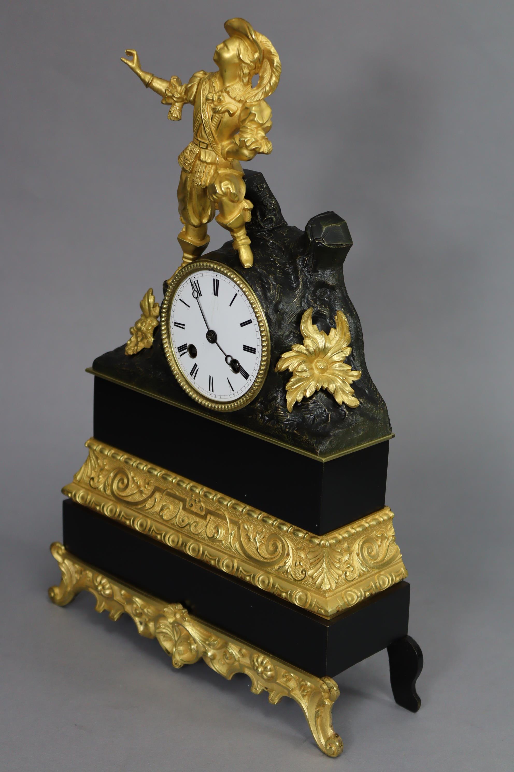 A 19th century French mantel clock in ebonised & gilt speltre case with figural surmount depicting a - Image 3 of 4