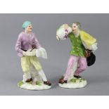 A PAIR OF 18th century MEISSEN PORCELAIN MALE STANDING FIGURES, the first of a baker holding a