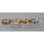 Four various 9ct. gold rings set gems or paste (some stones missing); & a white metal eternity