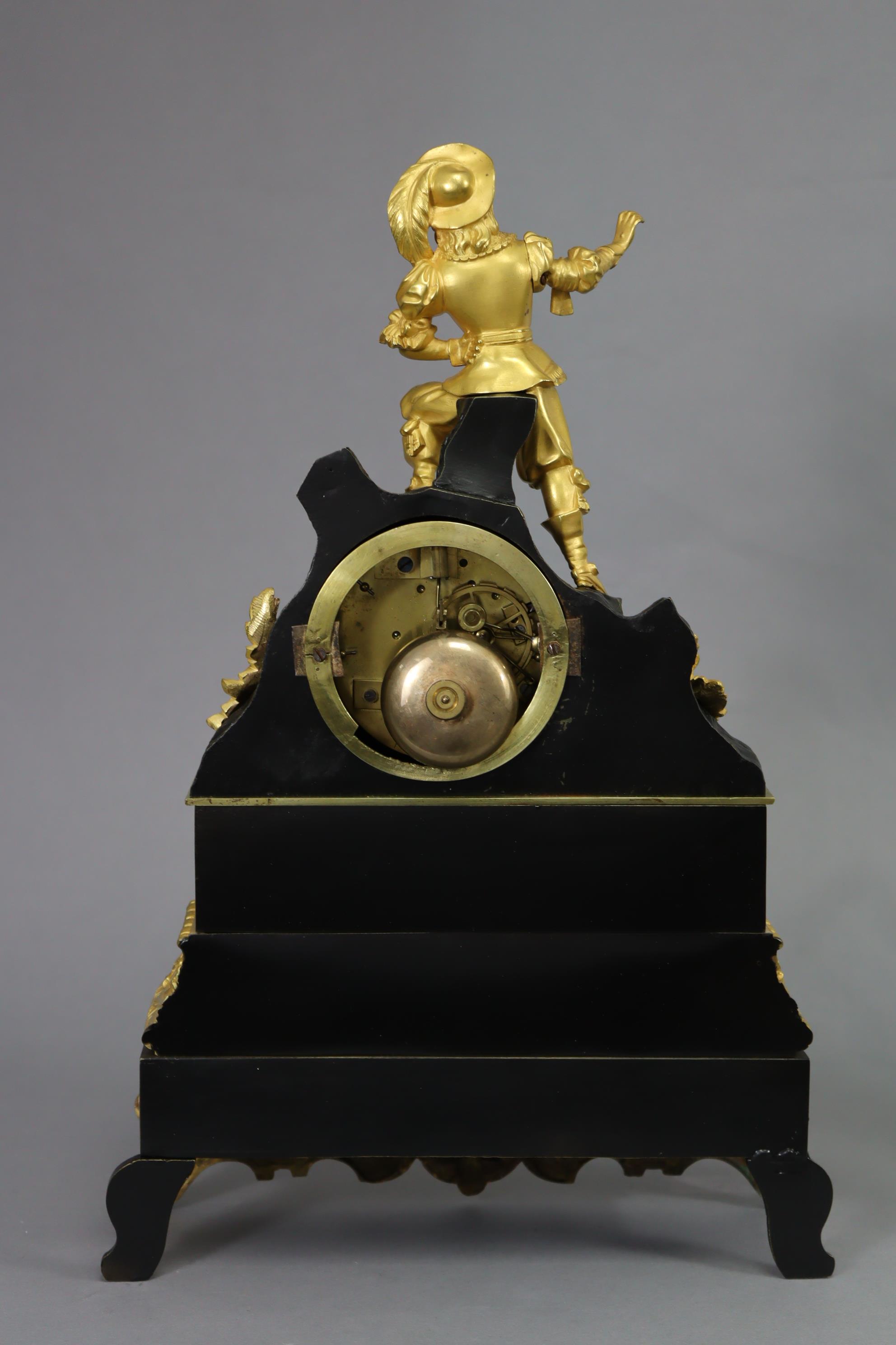 A 19th century French mantel clock in ebonised & gilt speltre case with figural surmount depicting a - Image 4 of 4