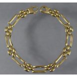 A 9ct. gold flexible bracelet of open rectangular links, 7½” long; (10.2gm).