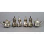 A pair of silver squat round mustard pots with blue glass liners & matching spoons, & pair of